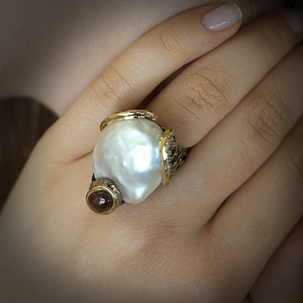 Anillo con perla y rubi